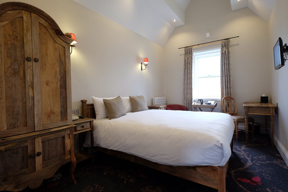 Bed and Breakfast Cotswold Grange Cheltenham Exteriér fotografie A room at the hotel